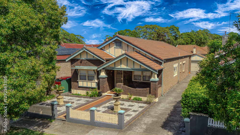 Old Restored Federation Suburban Sydney Double Brick with terrecotta Roof tiles timber window frames in western Sydney NSW Australia Old Restored Federation Suburban Sydney Double Brick with terrecotta Roof tiles timber window frames in western Sydney NSW Australia