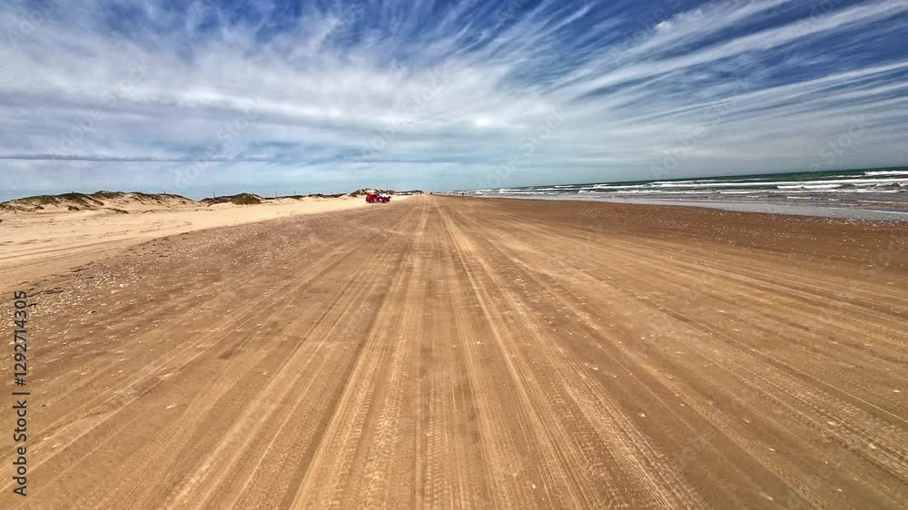 A drive down the beach on the Gulf of Mexico side of South Padre Island, Texas. A drive down the beach on the Gulf of Mexico side of South Padre Island, Texas.