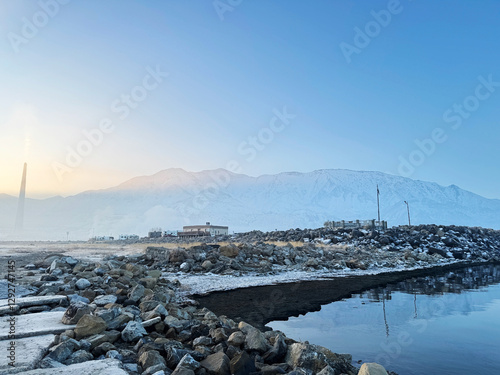 Salt Lake in the morning mist. State park observation deck and buildings. Kennecott Garfield Stack chimney.