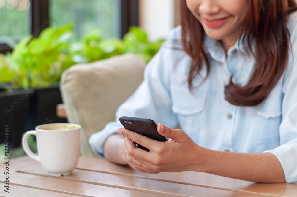 woman using smartphone for online shopping at home. Hand holding mobile phone with payment detail page display and credit card, stay home, technology, electronic commerce, internet, market place