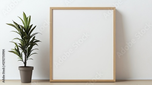A photo of an empty wooden frame mockup, standing on the floor next to a potted plant with a white wall background. A square-shaped frame stands upright against a plain white wall.