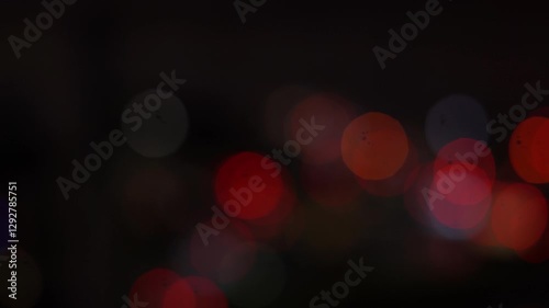Car Front and Rear Lights in Night Traffic with Defocused Lights Bokeh Mode Footage