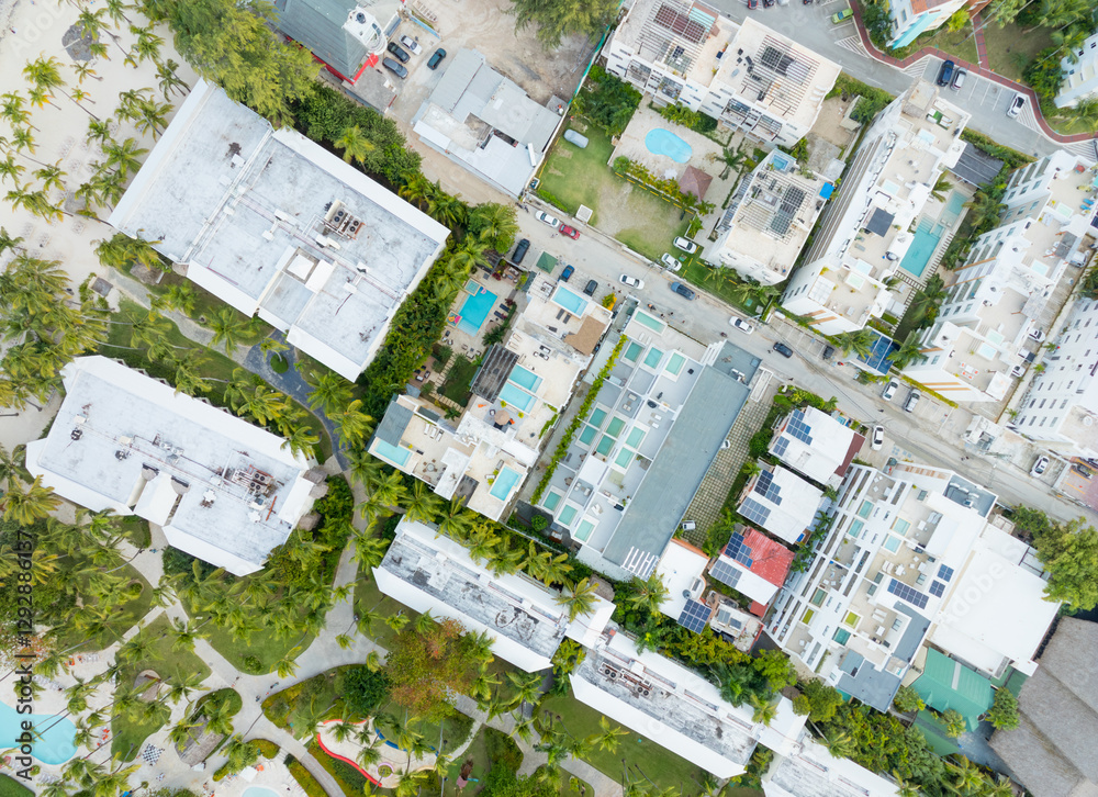 Fototapeta premium A city view with a lot of buildings and a pool
