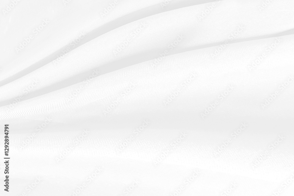 A white fabric texture with soft, flowing folds creating a gentle, abstract pattern A white fabric texture with soft, flowing folds creating a gentle, abstract pattern
