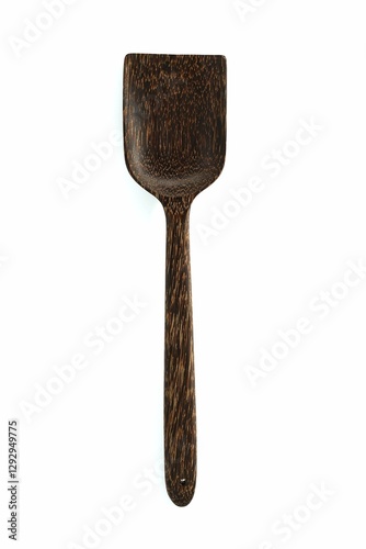 Wooden spatula isolated on white background, natural wood kitchen utensil, handcrafted cooking tool, top view.