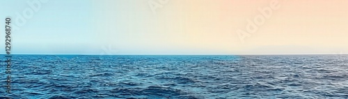 Wallpaper Mural A serene view of the ocean at dawn, showcasing a gradient sky and calm waters, creating a peaceful atmosphere. Torontodigital.ca