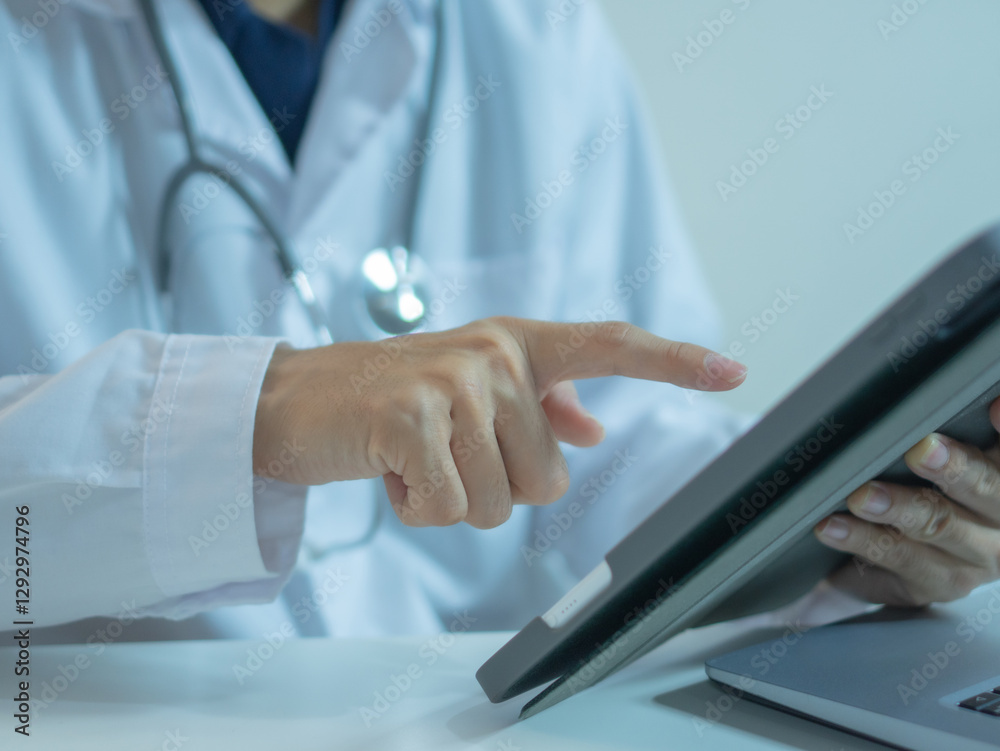 Close up doctor working, using tablet device communicate with patients in hospital ward. Close up doctor working, using tablet device communicate with patients in hospital ward.