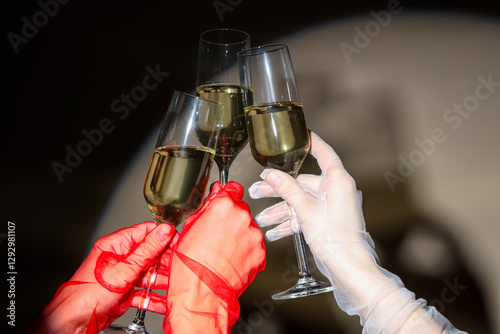 Female hands with glasses o...