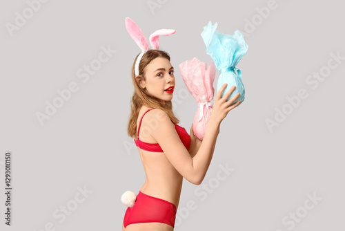 Sexy young woman in bunny e...