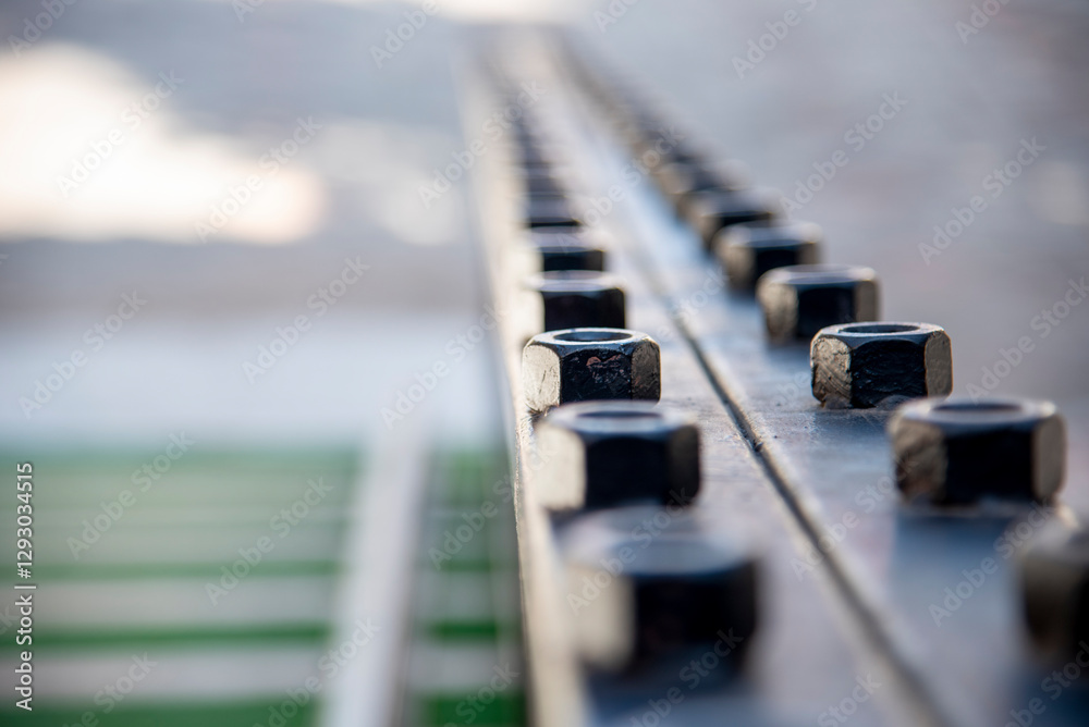 Parallel railroad heavy metal industry railway transportation. Close up rail link way for freight shipping railroad heavy manufacture engineering. Train vehicle railroad track station manufacturing Parallel railroad heavy metal industry railway transportation. Close up rail link way for freight shipping railroad heavy manufacture engineering. Train vehicle railroad track station manufacturing