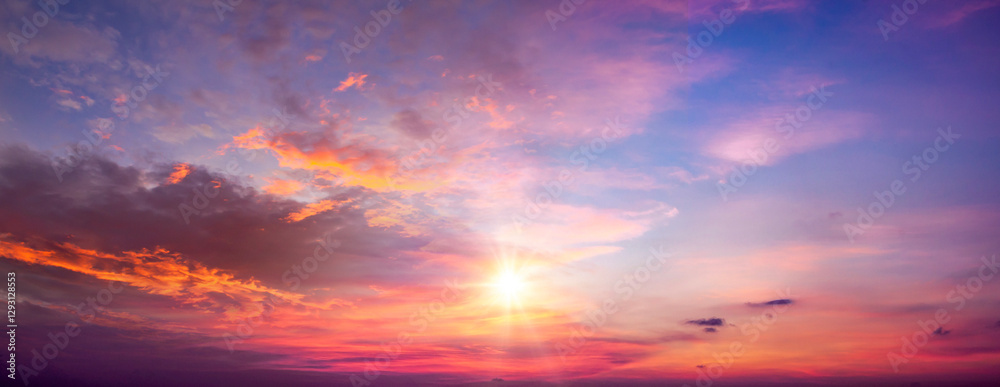 Fototapeta premium Sunset sky background. Panoramic view of sunset sky.