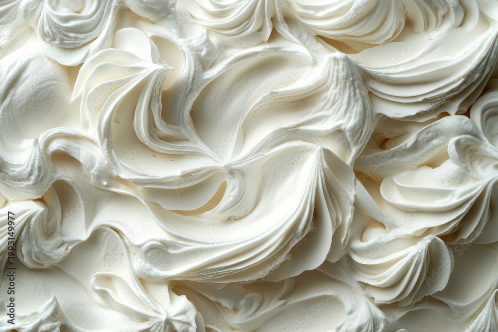 Obraz premium Creamy swirls of whipped topping showcasing texture and softness in a culinary context