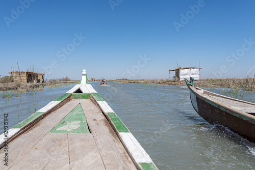 Obraz na płótnie Boat trip in the Mesopotamian / Iraqi Marshes with the so called Marsh Arabs Madan w salonie