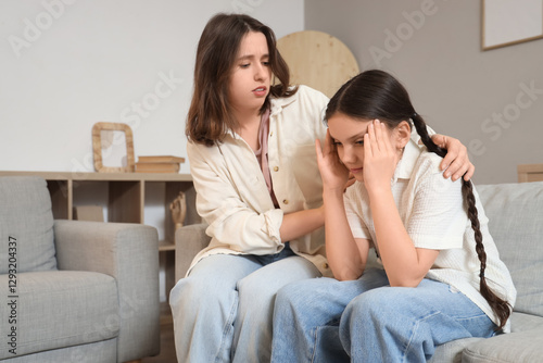 Teenage girl consoling upse...