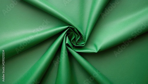 Vibrant green textured paper background showcasing a spiral design ideal for design projects and creative applications