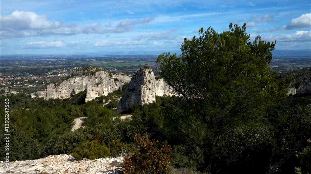 Massive rock formation in the Alpilles on a sunny day Massive rock formation in the Alpilles on a sunny day
