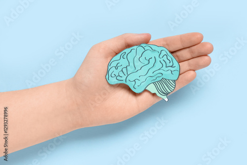 Female hand holding paper h...