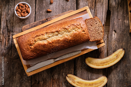 Almond banana bread. Powdered sugar, lilac, pie pieces.
