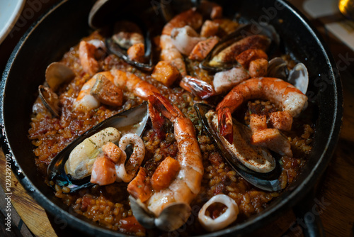 Close-up of Spanish traditional seafood paella. photo