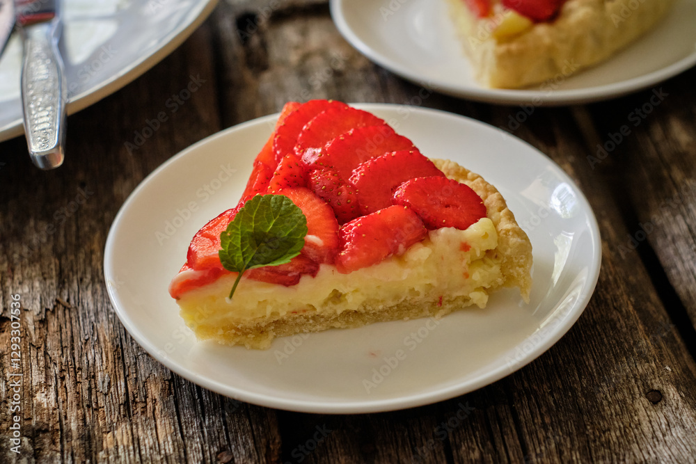 piece of Tart with custard, strawberries. Chamomile, mint, summer. piece of Tart with custard, strawberries. Chamomile, mint, summer.