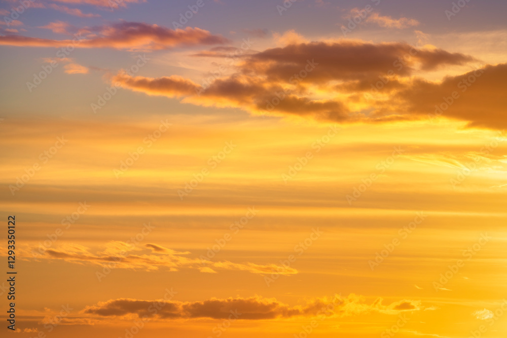 Obraz premium Dramatic red, orange, and yellow real fiery sky at sunset. Suitable for sky replacement, background or graphic design