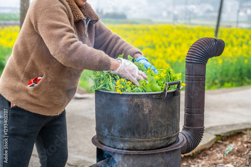 Rural women drying vegetables in spring and blanching cabbage moss in a pot
