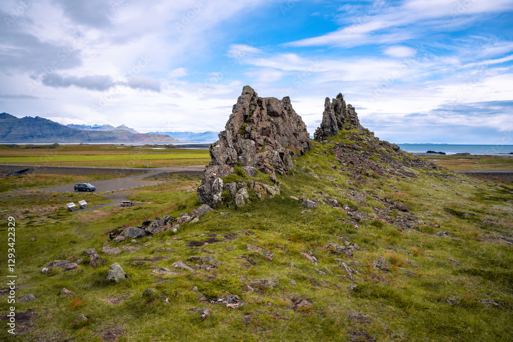 A breathtaking view of the Þvottaá area, showcasing stunning basalt dams and rugged rock formations near Álftafjörður bay in the Icelandic wilderness A breathtaking view of the Þvottaá area, showcasing stunning basalt dams and rugged rock formations near Álftafjörður bay in the Icelandic wilderness