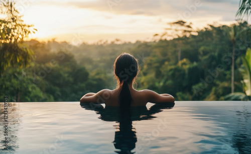 Serenity at sunset in a tranquil infinity pool overlooking nature