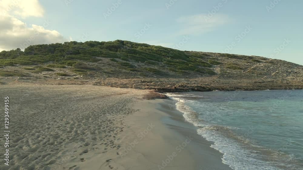 Experience the serene beauty of Cala Torta and Cala Mesquida in Mallorca. Soft waves lap against sandy shores under a sunny sky, perfect for relaxation and exploration. Experience the serene beauty of Cala Torta and Cala Mesquida in Mallorca. Soft waves lap against sandy shores under a sunny sky, perfect for relaxation and exploration.