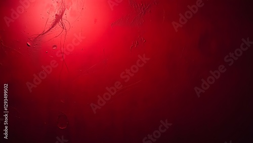  Dark and moody red grunge background with dramatic lighting and subtle texture. Perfect for horror, mystery, or dramatic themes in design and photography.