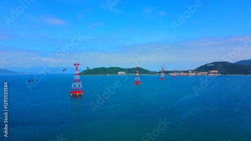 Cable car over the sea.

Vinpearl Island Cable Car to Vinwanders Amusement Park. Aerial drone shooting in Nha Trang, Vietnam. 