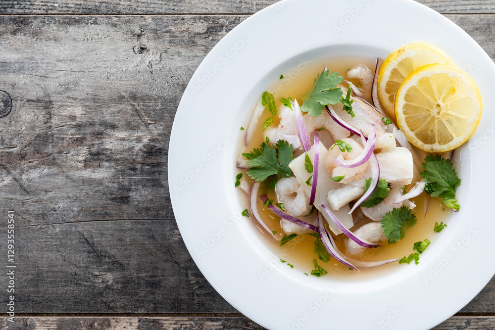 Traditional Peruvian ceviche sea bass fillet on wooden table. Top view. Copy space Traditional Peruvian ceviche sea bass fillet on wooden table. Top view. Copy space