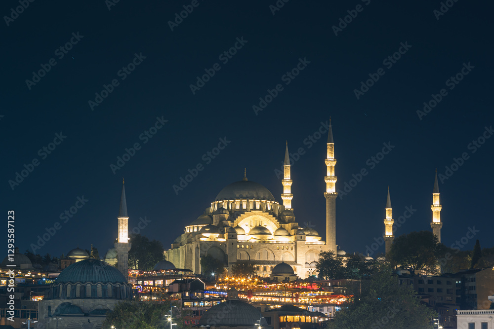 Fototapeta premium Suleymaniye and Rustem Pasa Mosques at night. Ramadan background photo