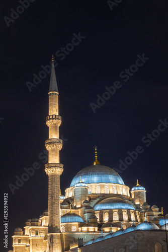 Ramadan or islamic concept. Eminonu Yeni Cami or New Mosque vertical photo