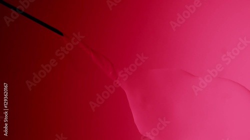 needle injects liquid on a red gradient background