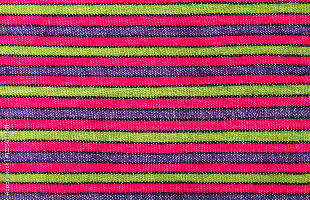 Closep up high resolution photo of a traditional North Indian wool fabric with vibrant colors and striped design Closep up high resolution photo of a traditional North Indian wool fabric with vibrant colors and striped design