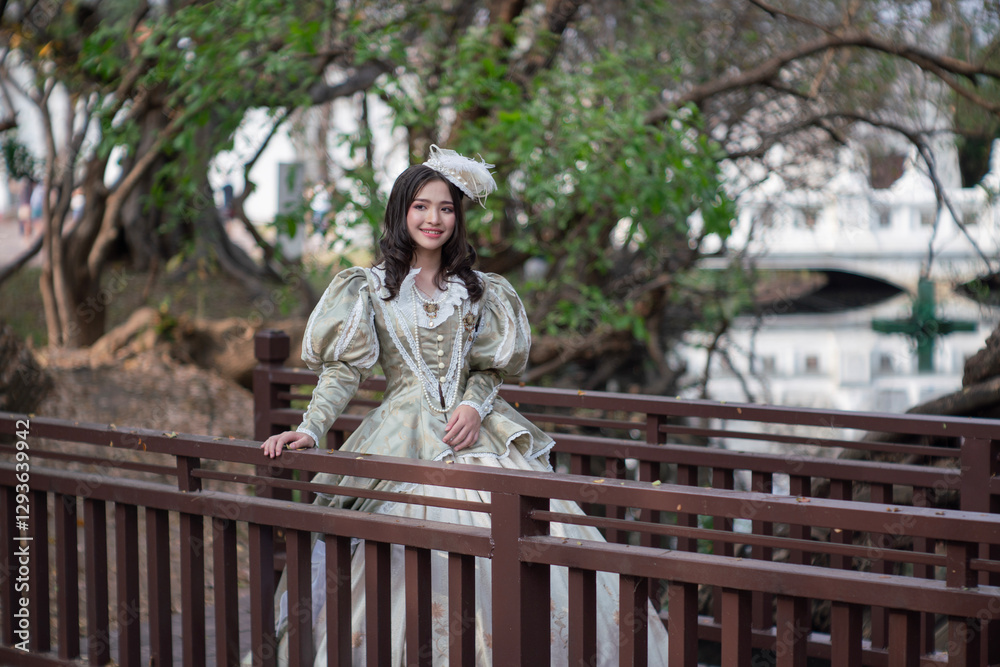Beautiful young woman wearing vintage clothes in a beautiful old place.