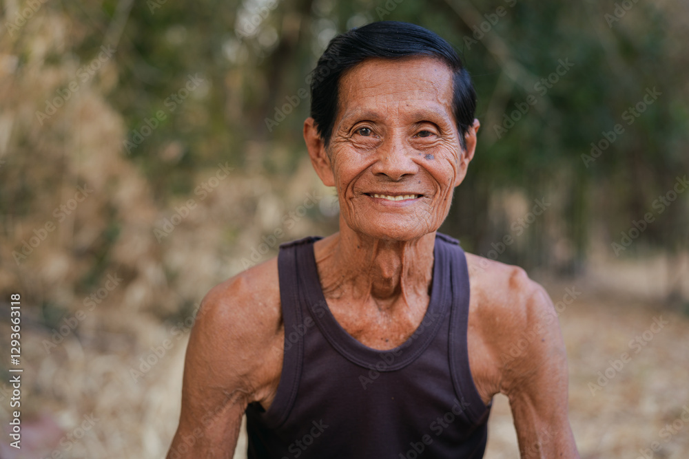 Portrait of attractive senior asian man smiling and looking at camera. father concept. Portrait of attractive senior asian man smiling and looking at camera. father concept.