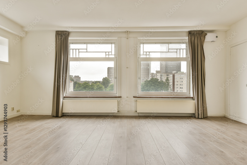 Fototapeta premium Bright and airy room featuring large windows that allow natural light, paired with minimalistic decor and wooden flooring, perfect for modern living.