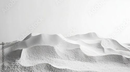 Elegant and flowing sand dune with light beige ripples on a white background, creating an abstract minimalist image. Simple yet dynamic natural forms in a serene setting.