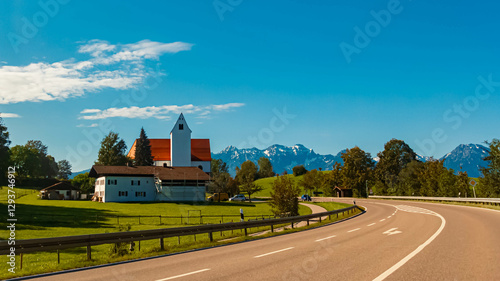 Alpine summer view near Saint Urban, Rieden, Lake Forggensee, Ostallgaeu, Bavaria, Germany
