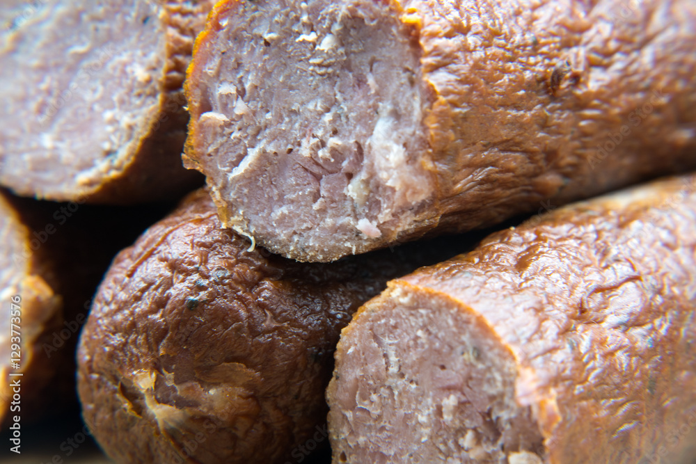 Dry smoked sausage, medium minced. Traditional taste and appetizing aroma.