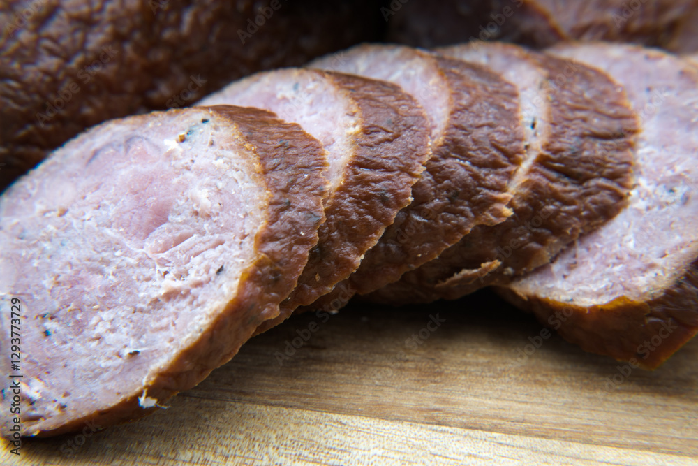 Dry smoked sausage, medium minced. Traditional taste and appetizing aroma.