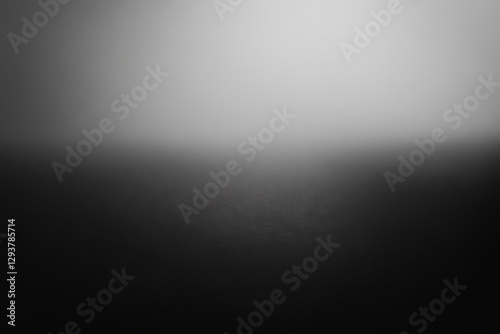 smooth gradient of black and white creates serene and minimalist background, perfect for various design projects