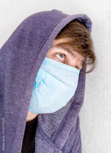 Obraz na płótnie Sad Man in Flu Mask w salonie