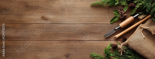 Gardening tools, gloves, and plants are beautifully arranged on a wooden table, creating an inspiring setup for gardening. photo