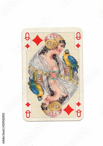 A decorative antique playing card in the suit of diamonds. photo