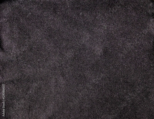 Texture of black denim fabric ,jeans background.