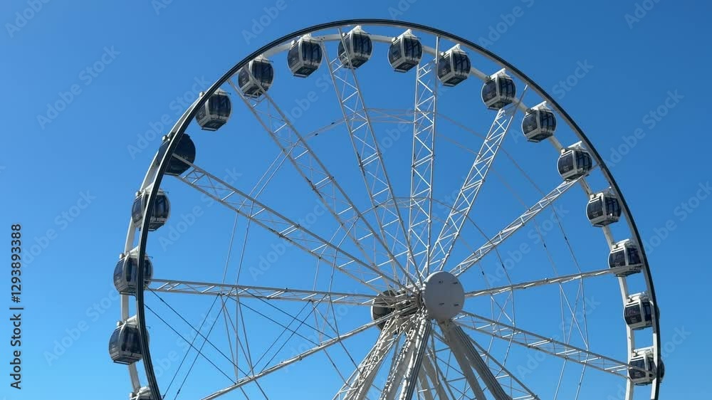 The big wheel at the Waterfront precinct in Cape Town, South Africa on a summer’s afternoon. The big wheel at the Waterfront precinct in Cape Town, South Africa on a summer’s afternoon.