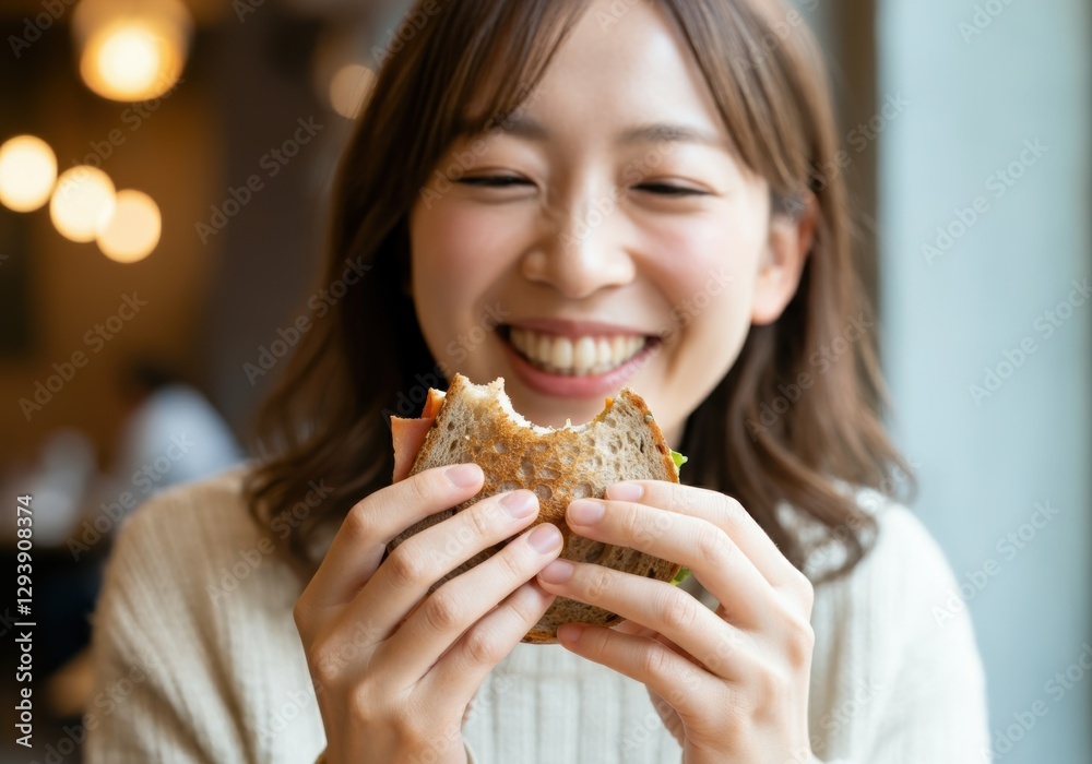 Woman enjoying a delicious sandwich with a joyful smile Woman enjoying a delicious sandwich with a joyful smile